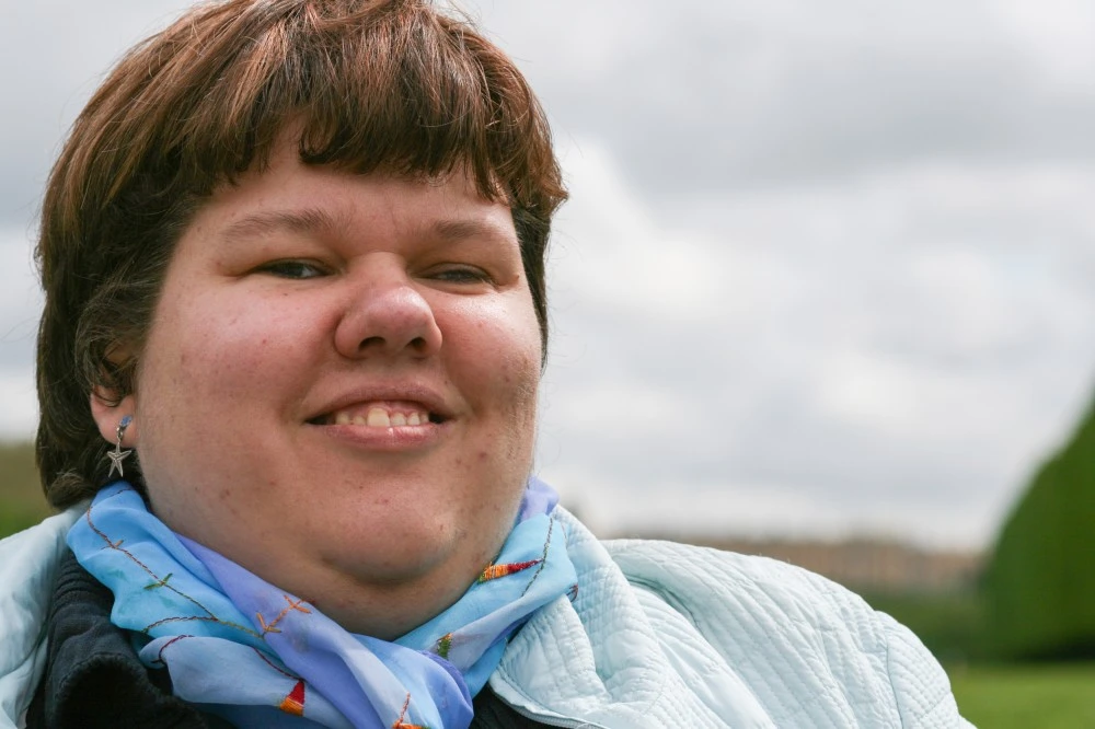 Disabled woman smiling at camera